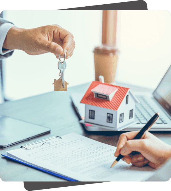 Here's an alt tag for the image: `House keys and contract signing`